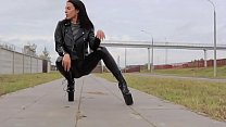 brunette wearing tight leather leggings high heels and a leather biker jacket min Konulu Porno